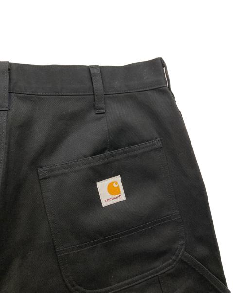 eYe COMME des GARCONS JUNYAWATANABE MAN（アイ コム デ ギャルソン ジュンヤ ワタナベ マン）eYe COMME des GARCONS JUNYAWATANABE MAN (アイ コム デ ギャルソン ジュンヤ ワタナベ マン) CarHartt (カーハート) カーゴワークトラウザーパンツ ブラック サイズ:S 未使用品の古着・服飾アイテム