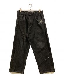 SOUTHPOLE（サウスポール）の古着「ペイント加工バギーデニムパンツ」｜ブラック