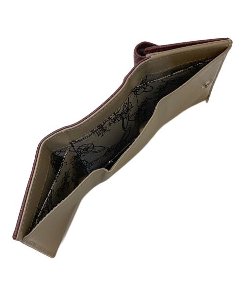 Vivienne Westwood（ヴィヴィアンウエストウッド）Vivienne Westwood (ヴィヴィアンウエストウッド) オーブ 3つ折り財布 ボルドーの古着・服飾アイテム