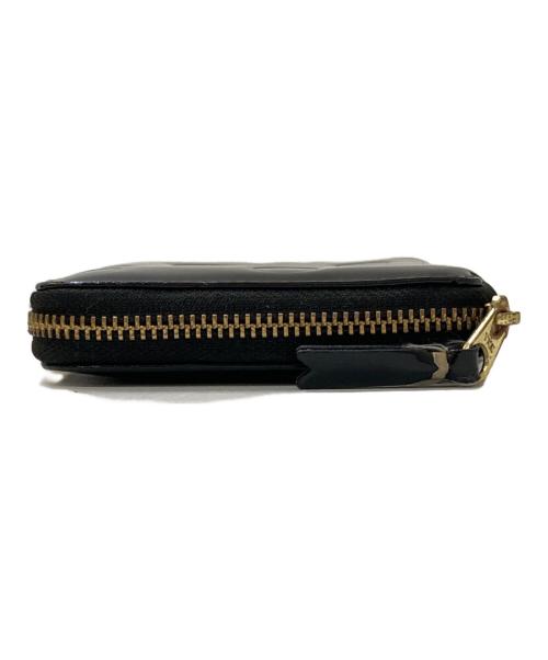 COMME des GARCONS（コムデギャルソン）COMME des GARCONS (コムデギャルソン) Dots Embossed Leather Line 財布 ブラックの古着・服飾アイテム