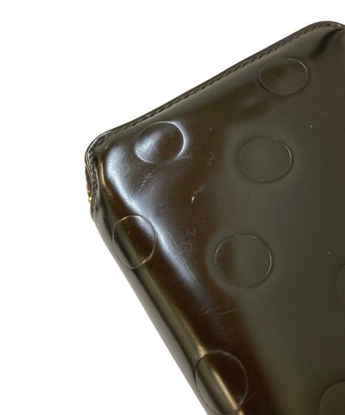 COMME des GARCONS（コムデギャルソン）COMME des GARCONS (コムデギャルソン) Dots Embossed Leather Line 財布 ブラックの古着・服飾アイテム