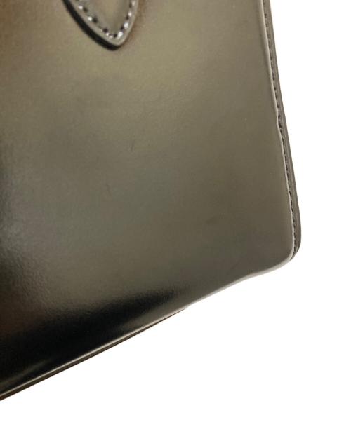 TOUT Y EST（トゥティエ）TOUT Y EST (トゥティエ) ハンドバッグ ブラックの古着・服飾アイテム