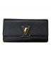 LOUIS VUITTON（ルイ ヴィトン）の古着「ポルトフォイユ・カプシーヌ」｜ブラック