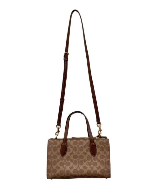 COACH（コーチ）COACH (コーチ) ニーナ スモール トート バッグ・シグネチャー キャンバス ブラウンの古着・服飾アイテム