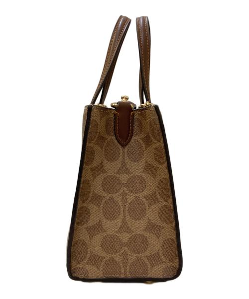 COACH（コーチ）COACH (コーチ) ニーナ スモール トート バッグ・シグネチャー キャンバス ブラウンの古着・服飾アイテム
