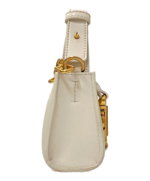 CHARLES & KEITH（チャールズアンドキース）CHARLES & KEITH (チャールズアンドキース) ミニショルダーバッグ アイボリーの古着・服飾アイテム