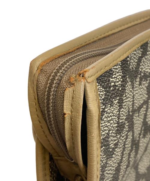 Yves Saint Laurent（イヴサンローラン）Yves Saint Laurent (イヴサンローラン) ジラフパターン セカンドバッグ ベージュの古着・服飾アイテム