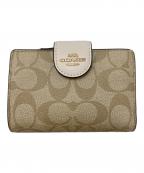 COACHコーチ）の古着「ミディアム コーナー ジップ ウォレット シグネチャー キャンバス」｜ベージュ