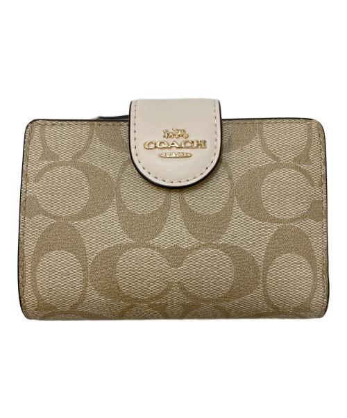 COACH（コーチ）COACH (コーチ) ミディアム コーナー ジップ ウォレット シグネチャー キャンバス ベージュの古着・服飾アイテム