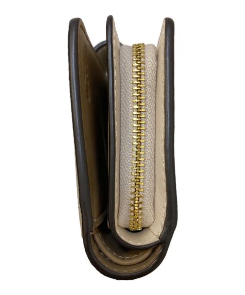 COACH（コーチ）COACH (コーチ) ミディアム コーナー ジップ ウォレット シグネチャー キャンバス ベージュの古着・服飾アイテム