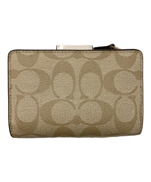 COACH（コーチ）COACH (コーチ) ミディアム コーナー ジップ ウォレット シグネチャー キャンバス ベージュの古着・服飾アイテム