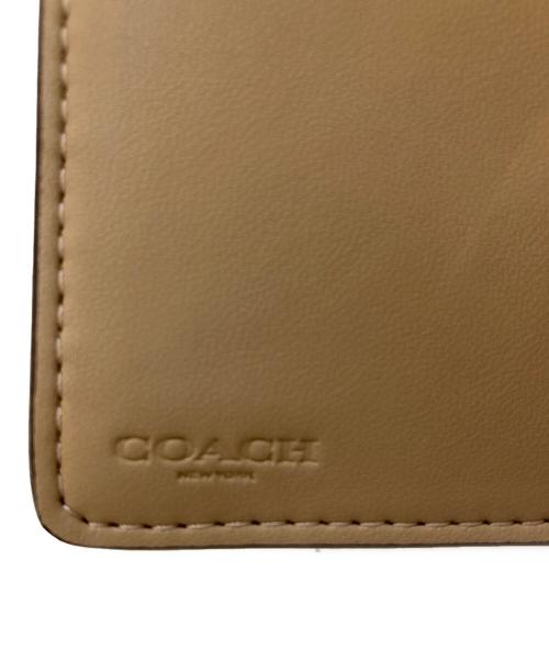 COACH（コーチ）COACH (コーチ) ミディアム コーナー ジップ ウォレット シグネチャー キャンバス ベージュの古着・服飾アイテム