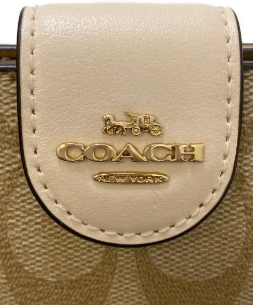 COACH（コーチ）COACH (コーチ) ミディアム コーナー ジップ ウォレット シグネチャー キャンバス ベージュの古着・服飾アイテム