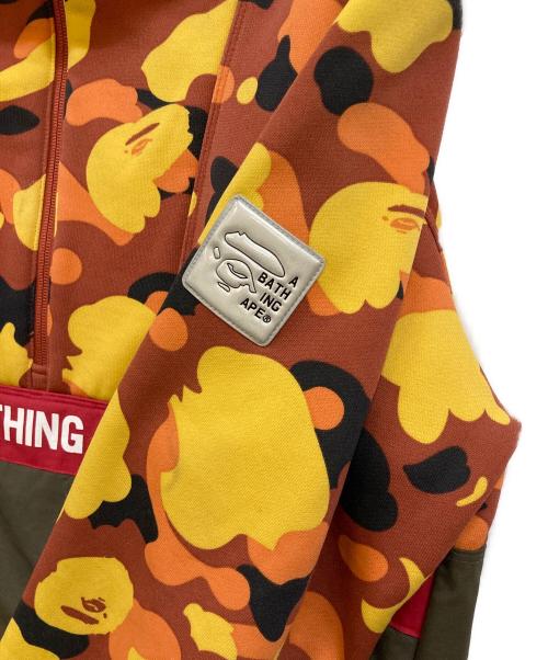 A BATHING APE（アベイシングエイプ）A BATHING APE (アベイシングエイプ) 1ST CAMO HALF ZIP PULLOVER HOODIE オレンジ サイズ:Ｌの古着・服飾アイテム