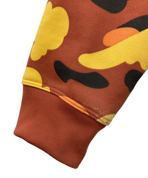 A BATHING APE（アベイシングエイプ）A BATHING APE (アベイシングエイプ) 1ST CAMO HALF ZIP PULLOVER HOODIE オレンジ サイズ:Ｌの古着・服飾アイテム