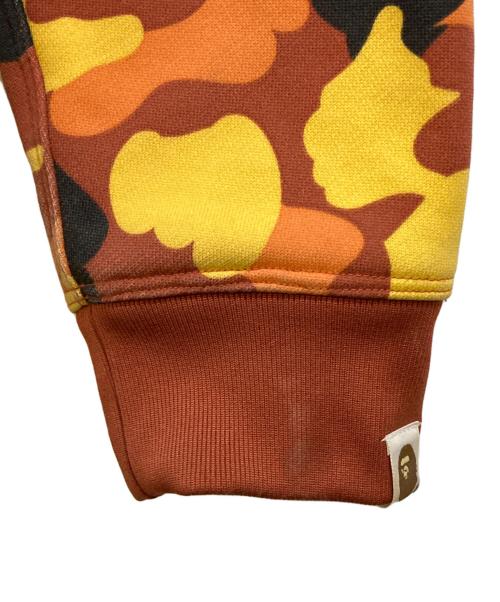 A BATHING APE（アベイシングエイプ）A BATHING APE (アベイシングエイプ) 1ST CAMO HALF ZIP PULLOVER HOODIE オレンジ サイズ:Ｌの古着・服飾アイテム