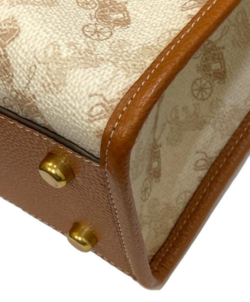 COACH（コーチ）COACH (コーチ) Dempsey Leather Animal Print Handbag ブラウン×ブラックの古着・服飾アイテム