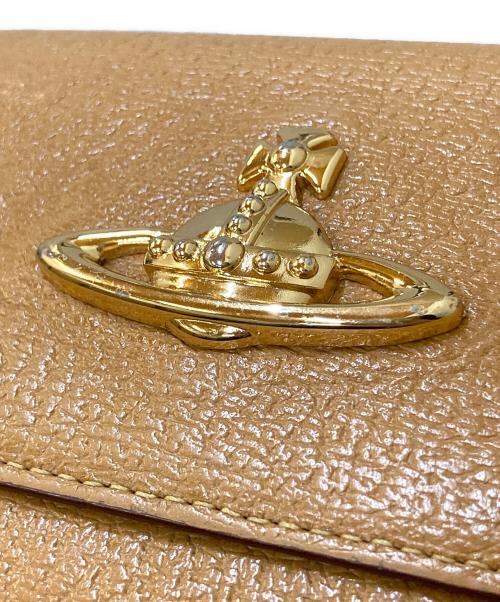 Vivienne Westwood（ヴィヴィアンウエストウッド）Vivienne Westwood (ヴィヴィアンウエストウッド) ビッグオーブ がま口三つ折り財布 キャメルの古着・服飾アイテム