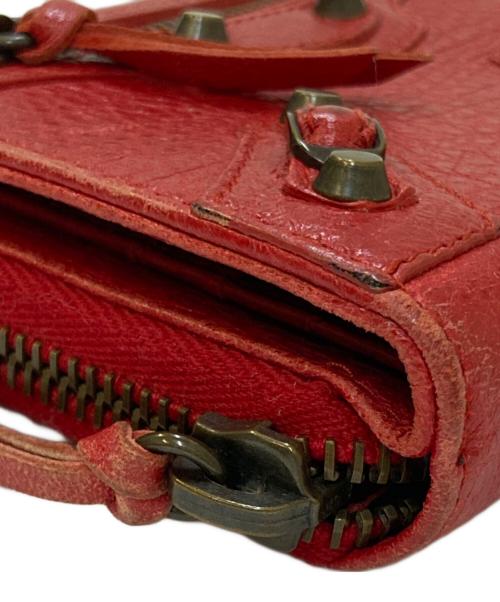 BALENCIAGA（バレンシアガ）BALENCIAGA (バレンシアガ) CLASSIC BILLFOLD ZIP 2つ折りレザー財布 レッドの古着・服飾アイテム