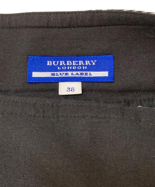 BURBERRY BLUE LABEL（バーバリー ブルー レーベル）BURBERRY BLUE LABEL (バーバリー ブルー レーベル) ベルト付ラップミニスカート グレー×ブラック サイズ:38の古着・服飾アイテム