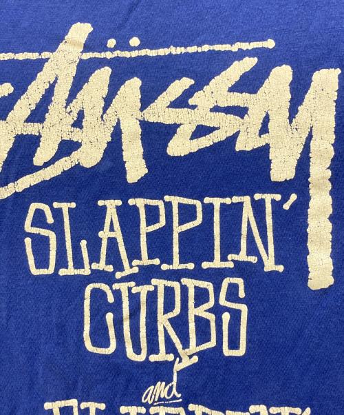 stussy（ステューシー）stussy (ステューシー) slappin curbs プリントTシャツ ブルー サイズ:Sの古着・服飾アイテム