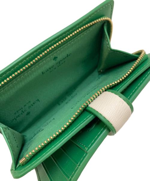 Kate Spade（ケイトスペード）Kate Spade (ケイトスペード) PEANUTS (ピーナッツ) コラボ 2つ折り レザーウォレット クリーム×グリーンの古着・服飾アイテム