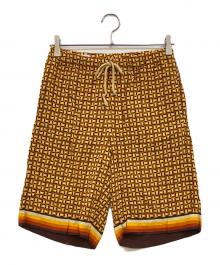 DRIES VAN NOTEN（ドリスヴァンノッテン）の古着「総柄ショーツ」｜オレンジ
