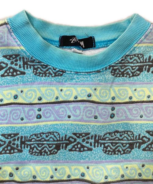 stussy（ステューシー）stussy (ステューシー) 総柄Tシャツ スカイブルー サイズ:Sの古着・服飾アイテム