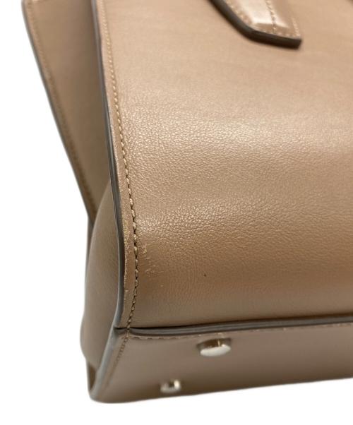 TOD'S（トッズ）TOD'S (トッズ) ホリー ミニハンドバッグ ベージュの古着・服飾アイテム