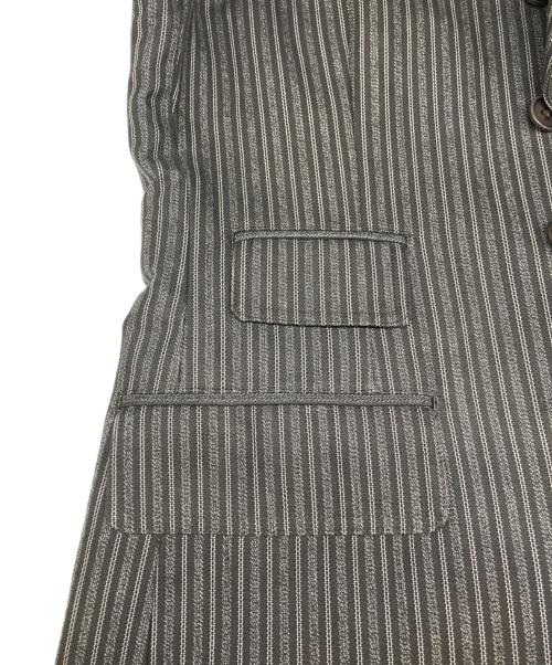 ADJUSTABLE COSTUME（アジャスタブルコスチューム）ADJUSTABLE COSTUME (アジャスタブルコスチューム) テーラードジャケット グレー サイズ:３６の古着・服飾アイテム