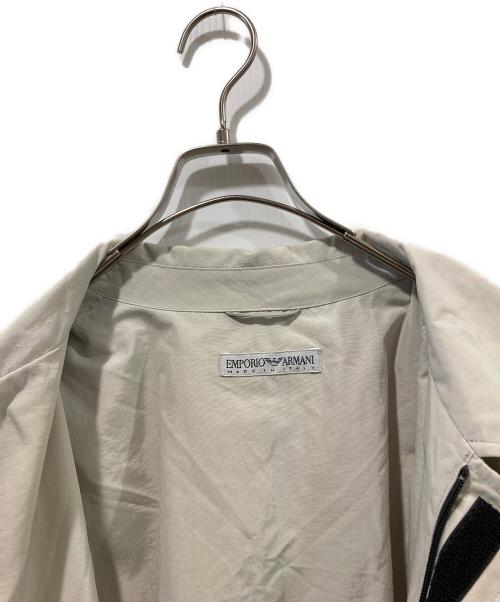 EMPORIO ARMANI（エンポリオアルマーニ）EMPORIO ARMANI (エンポリオアルマーニ) ナイロンステンカラーコート ベージュ サイズ:80の古着・服飾アイテム