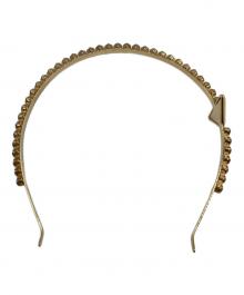 PRADA（プラダ）の古着「トライアングルロゴ ヘッドバンド カチューシャ」｜ゴールド
