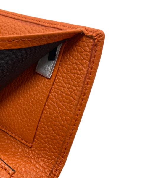 JIMMY CHOO（ジミーチュウ）JIMMY CHOO (ジミーチュウ) 3つ折り財布 オレンジの古着・服飾アイテム