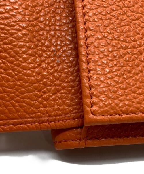 JIMMY CHOO（ジミーチュウ）JIMMY CHOO (ジミーチュウ) 3つ折り財布 オレンジの古着・服飾アイテム