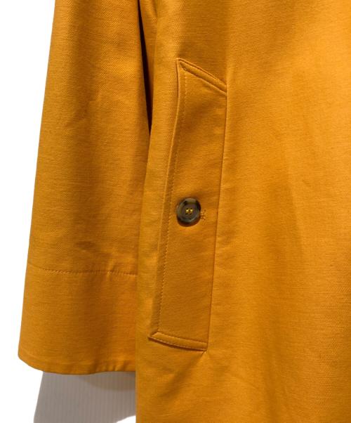 AMI Alexandre Mattiussi（アミアレクサンドルマテュッシ）AMI Alexandre Mattiussi (アミアレクサンドルマテュッシ) ステンカラーコート オレンジ サイズ:XSの古着・服飾アイテム