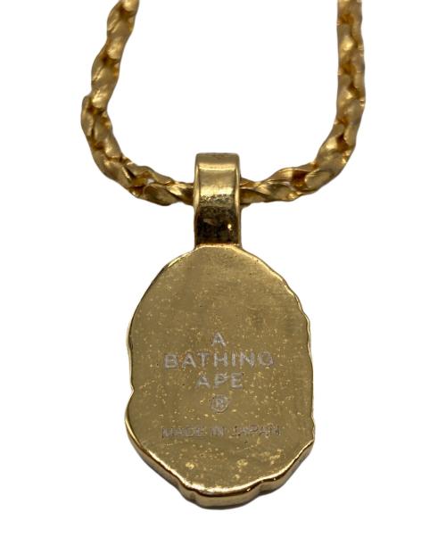 A BATHING APE（ア ベイシング エイプ）A BATHING APE (ア ベイシング エイプ) ストーンロゴネックレス ゴールドの古着・服飾アイテム