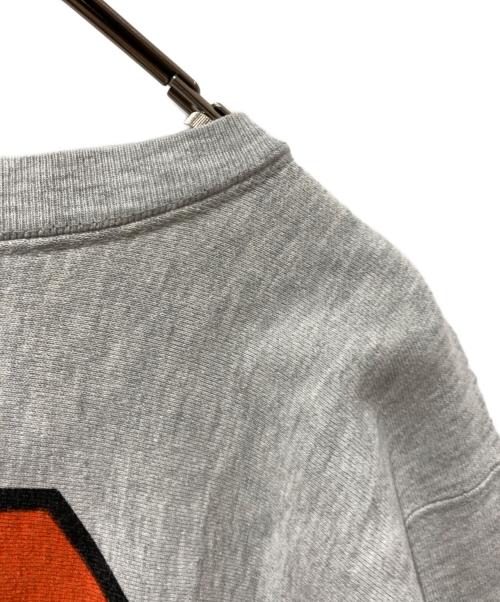 Champion（チャンピオン）Champion (チャンピオン) 両面染み込みプリントリバースウィーブスウェット グレー×オレンジ サイズ:不明の古着・服飾アイテム