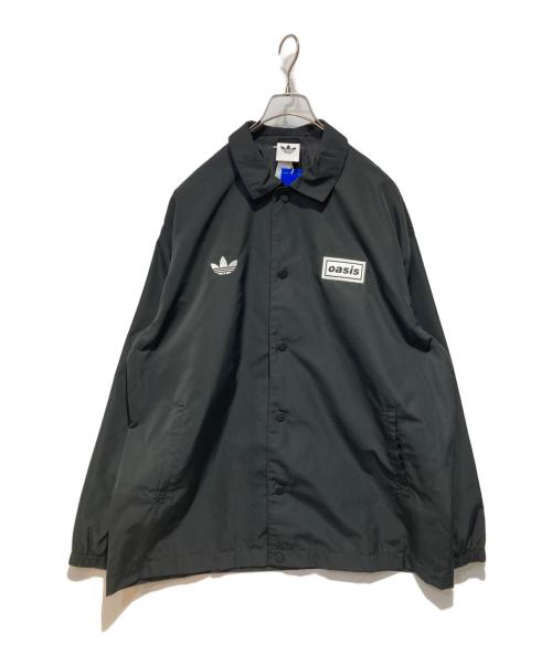 adidas（アディダス）adidas (アディダス) oasis (オアシス) TOUR COACH JACKET ブラック サイズ:Ｌ 未使用品の古着・服飾アイテム