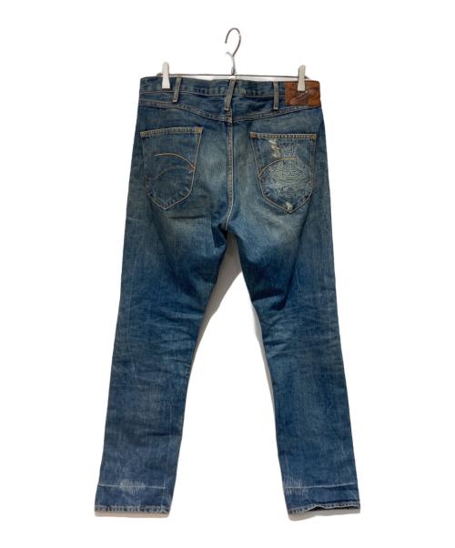 LEE（リー）LEE (リー) Vivienne Westwood (ヴィヴィアンウエストウッド) デニムパンツ インディゴ サイズ:W32の古着・服飾アイテム