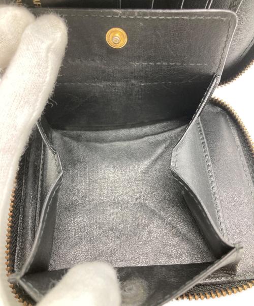 COMME des GARCONS（コムデギャルソン）COMME des GARCONS (コムデギャルソン) EMMBOSSED LOGOTYPE 1 WALLET ブラックの古着・服飾アイテム