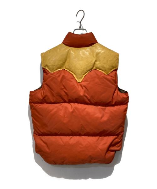 RockyMountainFeatherBed（ロッキーマウンテンフェザーベッド）RockyMountainFeatherBed (ロッキーマウンテンフェザーベッド) ダウンベスト オレンジ サイズ:不明の古着・服飾アイテム