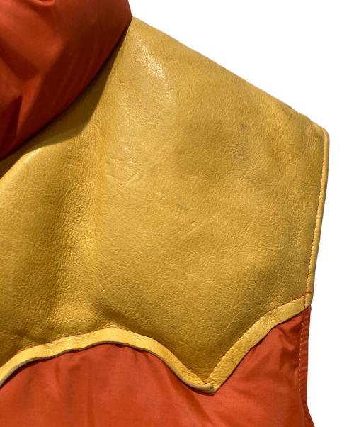 RockyMountainFeatherBed（ロッキーマウンテンフェザーベッド）RockyMountainFeatherBed (ロッキーマウンテンフェザーベッド) ダウンベスト オレンジ サイズ:不明の古着・服飾アイテム