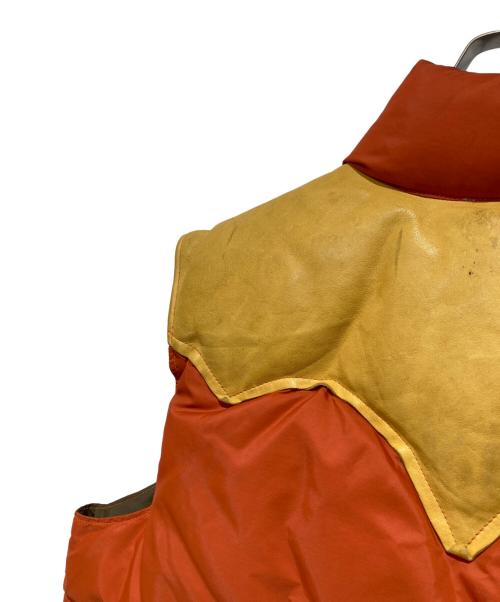 RockyMountainFeatherBed（ロッキーマウンテンフェザーベッド）RockyMountainFeatherBed (ロッキーマウンテンフェザーベッド) ダウンベスト オレンジ サイズ:不明の古着・服飾アイテム