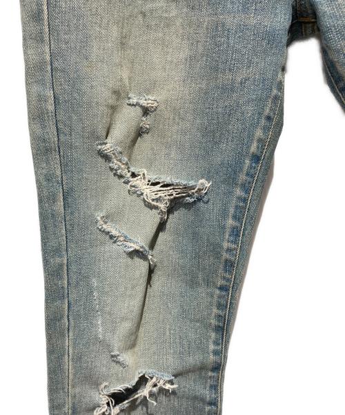Saint Laurent Paris（サンローランパリ）Saint Laurent Paris (サンローランパリ) デストロイ加工デニムパンツ インディゴ サイズ:SIZE 68.5cm (W27)の古着・服飾アイテム
