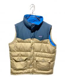 Patagonia（パタゴニア）の古着「ダウンベスト」｜ベージュ×ネイビー