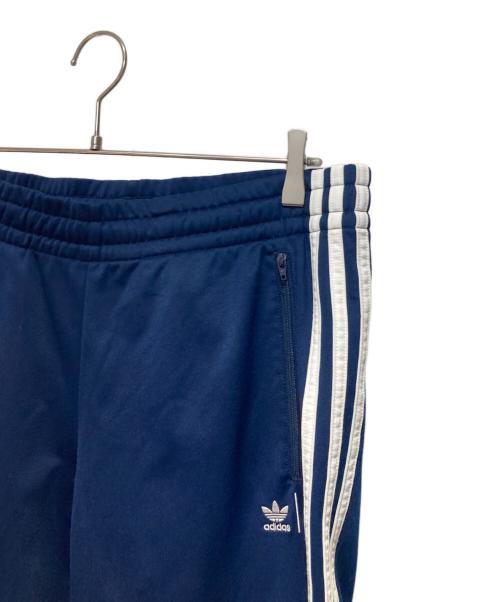 adidas（アディダス）adidas (アディダス) HUMAN MADE (ヒューマンメイド) トラックパンツ ネイビー サイズ:Mの古着・服飾アイテム
