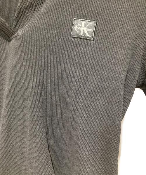 Calvin Klein Jeans（カルバンクラインジーンズ）Calvin Klein Jeans (カルバンクラインジーンズ) ポロシャツ ブラック サイズ:XSの古着・服飾アイテム