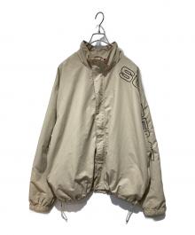 SUPREME（シュプリーム）の古着「SPELLOUT EMBROIDERED TRACK JACKET」｜ベージュ