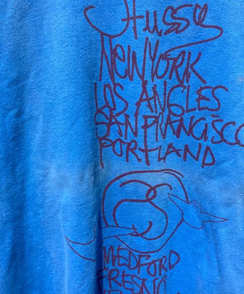stussy（ステューシー）stussy (ステューシー) World tour Tee Mark Gonzales ブルー サイズ:Ｌの古着・服飾アイテム