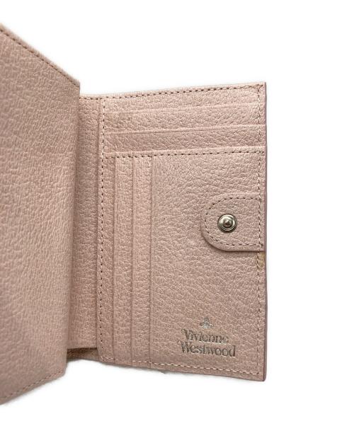 Vivienne Westwood（ヴィヴィアンウエストウッド）Vivienne Westwood (ヴィヴィアンウエストウッド) オーブロゴ3つ折り財布 ピンクの古着・服飾アイテム
